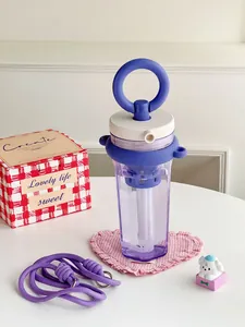 Detail of purple portable straw water bottle with filter and adjustable shoulder strap