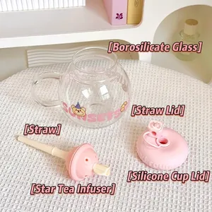 Detailed view of the cute chubby glass tea cup components including pink silicone lid and straw