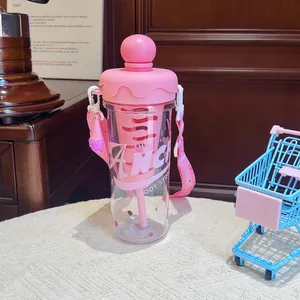 Detailed macro view of the cute pink ice cream themed plastic water bottle with its strap