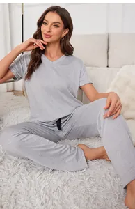 Detail of women's gray V-neck short sleeve loungewear set with matching long pants