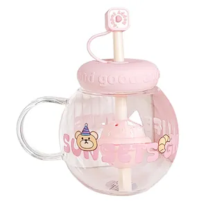Adorable chubby pink spherical glass water cup with straw and bear cartoon design