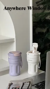 Minimalist portable insulated coffee mugs in aesthetic purple and creamy white colors.