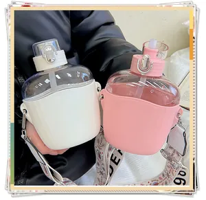 Detail of two minimalist portable plastic water bottles with straws and carrying straps.