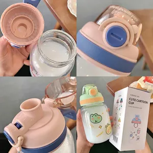Cute cartoon glass water bottle with leak-proof bouncing lid for kids and students.