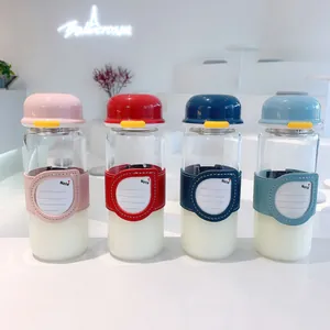 Set of four colorful cute glass water bottles with portable heat-insulated sleeves.