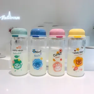 Set of four cute Korean style glass water bottles with colorful lids and cartoon prints