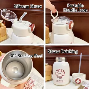 White stainless steel thermos bottle with silicone straw and portable loop handle