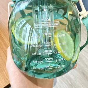 Detail of 1100ml green big belly water bottle showing time scales and tea infuser