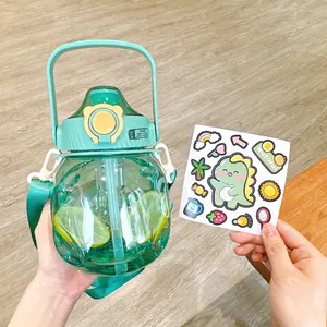 Detail view of mint green large water bottle with DIY stickers and straw