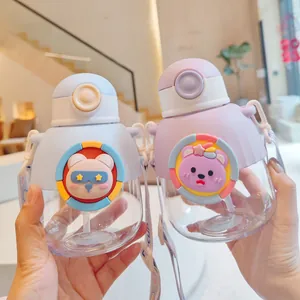 Detailed close-up view of two cute cartoon belly water bottles for kids with adjustable straps.