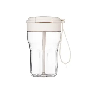 Minimalist transparent plastic coffee cup with integrated straw and portable silicone strap