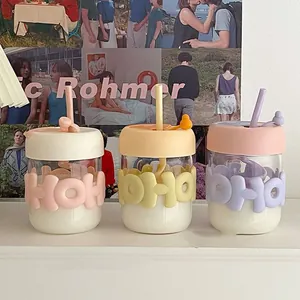 Cute ins style glass straw cups with wavy pastel silicone sleeves for stylish drinking