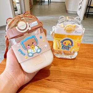 Close-up of cute cartoon bear and duck square straw water bottles for kids