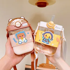Pair of cute square cartoon water bottles for kids with straw and adjustable strap.