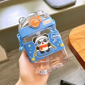 Detail of cute panda cartoon flat plastic straw cup with blue sleeve and strap for kids