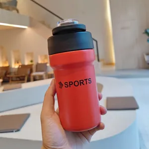Close-up of a red stainless steel sports water bottle with a dual-drink lid.