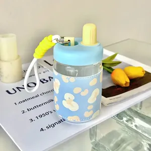 Bouteille d'eau en verre portable avec étui en cuir léopard et dragonne douce