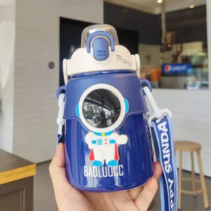 Close-up detail of astronaut theme blue insulated stainless steel belly cup with strap