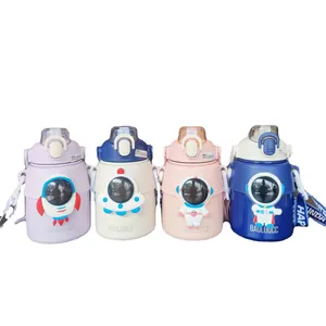 Four colorful astronaut themed insulated water bottles with straws and portable straps.