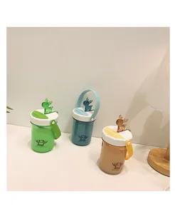 Close-up of cute portable deer-themed plastic water cups with convenient carry handles.