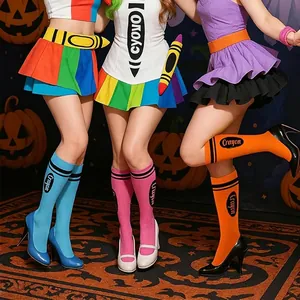 Close-up of vibrant Halloween crayon socks in blue, pink, and orange for parties