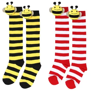 Close-up of children's striped knee-high socks with cute 3D bumblebee plush doll detail