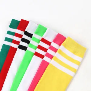 Close-up of colorful three-stripe knit thigh-high socks for kids in various bright shades