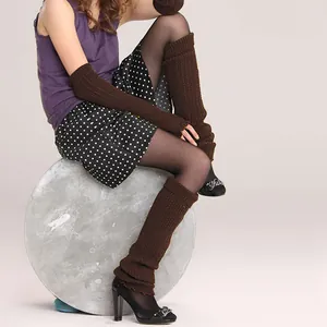 Detailed view of dark brown knitted leg warmers and matching arm warmers for ballet and yoga