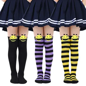 Detailed view of kids cute bee over-the-knee socks with 3D plush bumblebee dolls