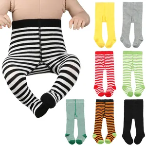 Assorted baby footed leggings featuring festive stripes and solid colors in a grid layout