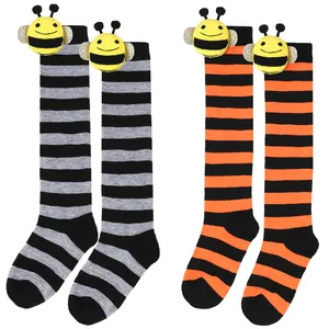 Two pairs of striped knee-high socks for girls featuring cute 3D bee doll ornaments.