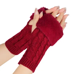 Detail view of stylish wine red cable knit fingerless gloves with soft faux fur trim