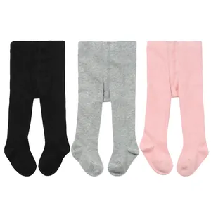 Collection of infant footed leggings in black, grey, and pink, set of three baby tights