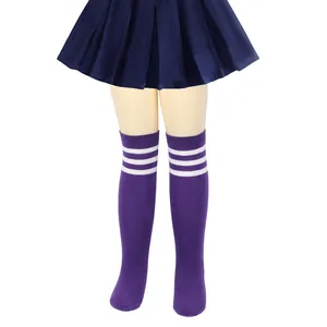 Close-up detail of purple children's knee-high socks with three white stripes design.