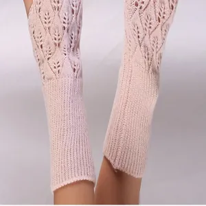 Detailed view of pink hollow-out knitted long fingerless arm warmers for women