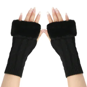 Close-up of cable knit fingerless gloves with plush faux fur trim detail