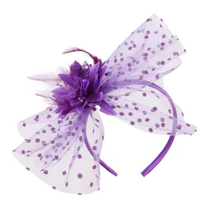 Elegant purple fascinator headband with mesh and feather detail for weddings