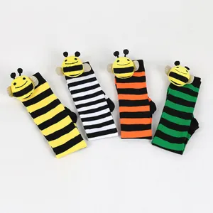 Colorful striped children's knee-high socks featuring cute 3D plush honeybee doll accents