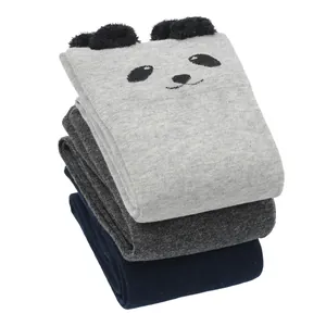Detail of stacked cute panda patterned high socks in grey, charcoal, and navy colors