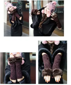 Detailed view of long brown cable-knit arm warmers with soft faux fur trim for women