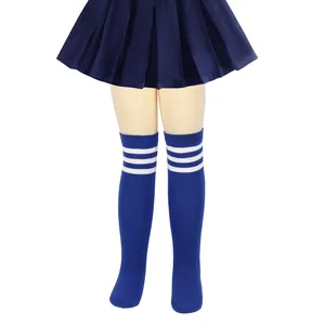 A detailed close-up of blue children's knee-high socks with triple white stripes