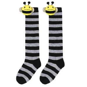 Cute children's knee-high socks with black and grey stripes and 3D honeybee plush