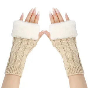 Beige cable knit fingerless gloves with soft white faux fur trim detail for winter