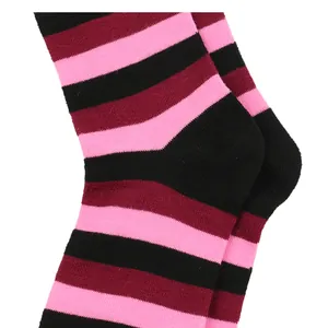 Close-up detail of striped knee-high socks in black, burgundy and pink colors