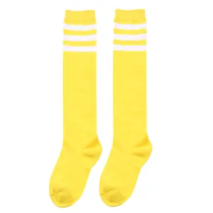 Bright yellow children's knee-high socks featuring three decorative athletic white stripes