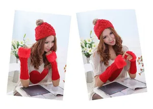 Cozy red knitted fingerless gloves and pom-pom hat set with faux fur trim detail