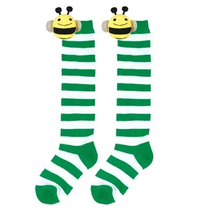 Cute green and white striped knee-high socks for kids featuring 3D plush bumblebee dolls.