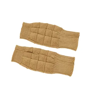 Detail shot of camel knitted fingerless gloves with unique textured checkered pattern