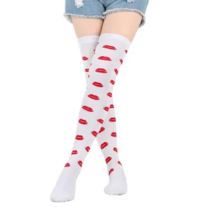 Detail view of white over-the-knee socks featuring red lip prints for Valentine's Day party