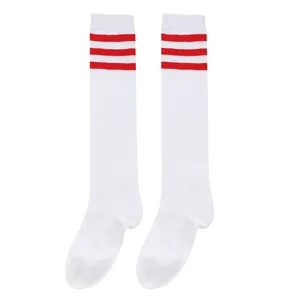 Detailed view of white children's knee-high socks featuring three vibrant red stripes